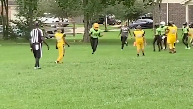 Mom chases boy for tackling her son during Houston football game