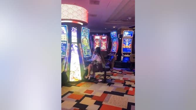 Woman peeing on casino floor