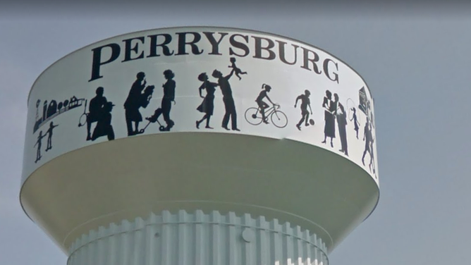 Perrysburg Ohio water tower black silhouettes racist