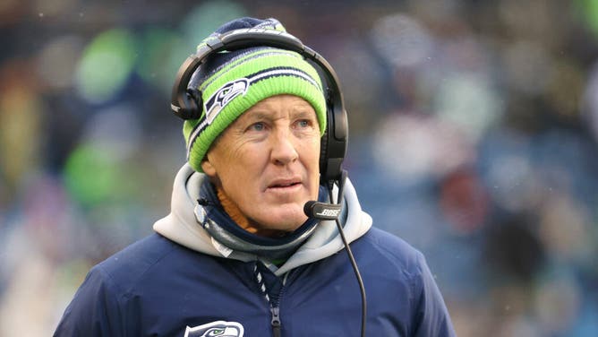 Pete Carroll played scout team QB during a Seattle Seahawks practice. (Photo by Abbie Parr/Getty Images)