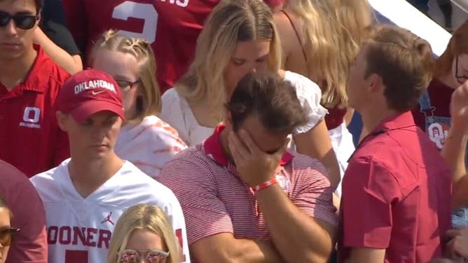 This appears to be the moment where all of the spirit leaves the Oklahoma fans body and grief over the Texas loss completely overcomes him. Could this be the next great meme?