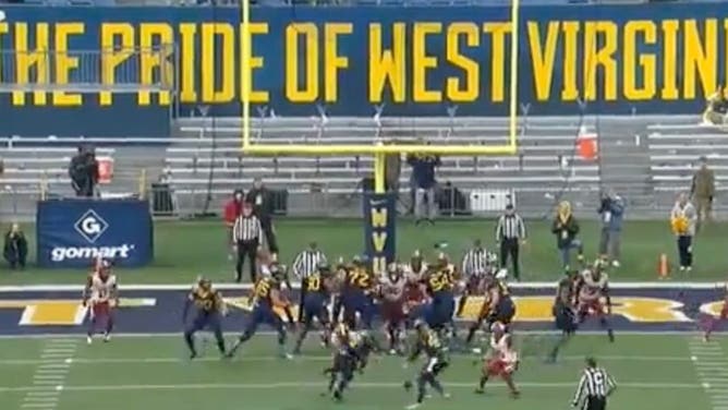 Whoops! West Virginia botches extra point snap and Oklahoma returns it for two points.