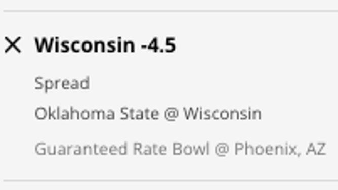 The Wisconsin Badgers' odds vs. the Oklahoma State Cowboys in the Guaranteed Rate Bowl from DraftKings Sportsbook as of Tuesday, Dec. 27 at 1 p.m. ET.