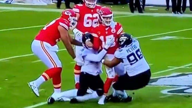 Jacksonville Jaguars defender Arden Key is not looking at Chiefs QB Patrick Mahomes legs when he falls to the ground.
