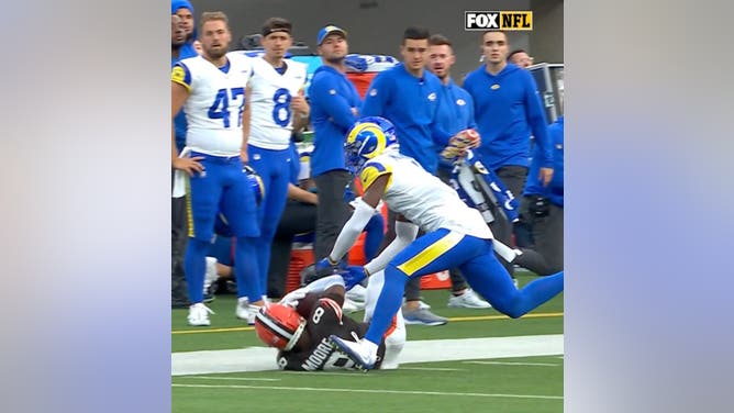 NFL referee John Hussey ruled that Browns WR Elijah Moore caught a pass against the Rams because his 