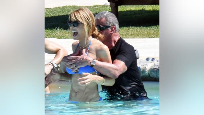 Sylvester Stallone Grabs Bikini-Clad Wife Jennifer Flavin's Boobs