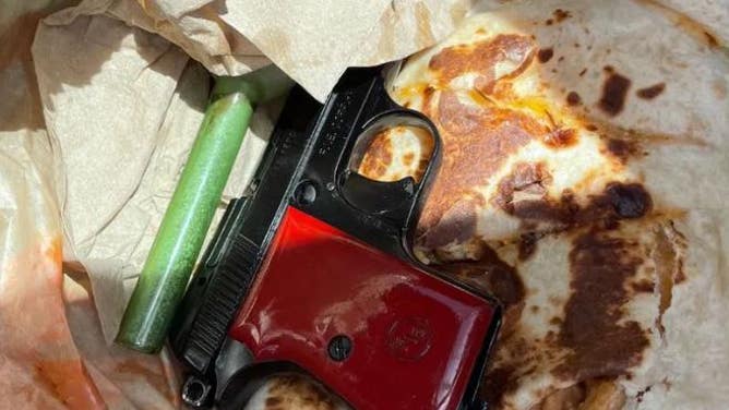 Handgun In His Taco Bell Bag