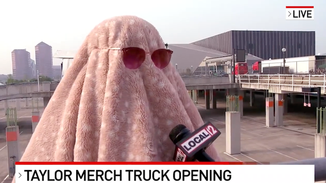 e6e4d17a-Taylor-swift-fan-Cincinnati-merch-truck-costume-local-news-interview-1