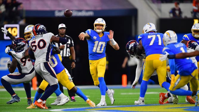 Los Angeles Chargers QB Justin Herbert rips a ball over the middle vs. the Denver Broncos at SoFi Stadium in Inglewood, California.