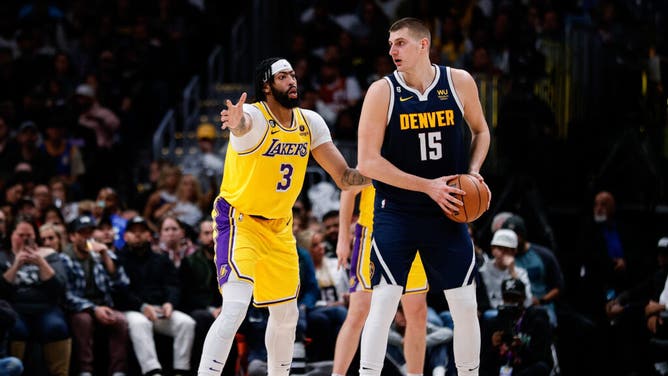 Nuggets C Nikola Jokic posts up Lakers PF Anthony Davis in the 2nd quarter at Ball Arena in Denver.