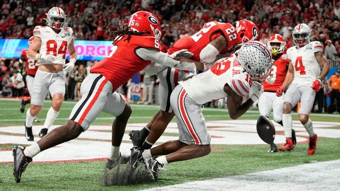 Ohio State WR Marvin Harrison Jr. makes a toe-tap TD catch vs. Georgia during the 2023 Peach Bowl in the College Football Playoff semifinal at Mercedes-Benz Stadium in Atlanta.