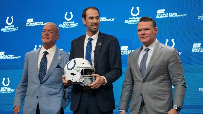 New coach Shane Steichen poses with Colts CEO Jim Irsay and General Manager Chris Ballard.