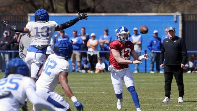 Kentucky QB Devin Leary throws the ball during open practice for the fans.