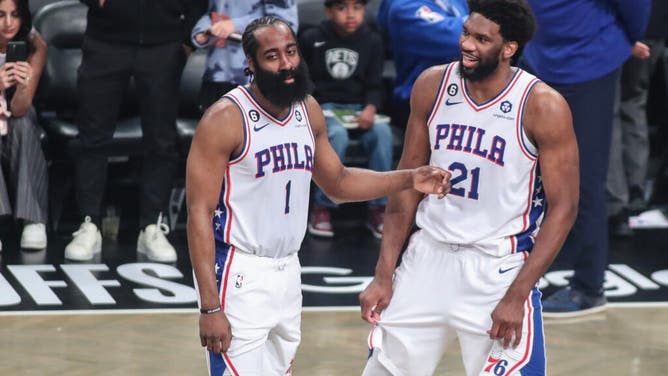 Former Philadelphia 76ers PG James Harden talks with center Joel Embiid during the 2023 NBA playoffs vs. the Nets at Barclays Center in Brooklyn.