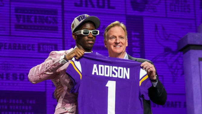 Former USC WR Jordan Addison with NFL commissioner Roger Goodell after being selected by the Vikings in the 1st round of the 2023 NFL Draft.
