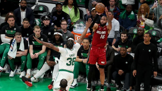 Heat wing Caleb Martin shoots a 3-pointer over Celtics G Marcus Smart during Game 1 of the ECF.