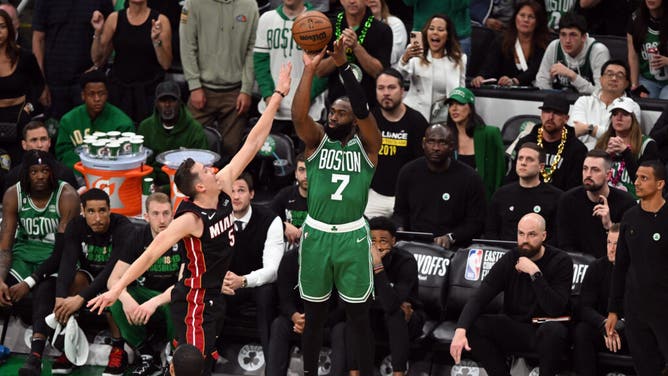 Celtics SG Jaylen Brown chucks a 3-pointer over Heat F Nikola Jovic at TD Garden.