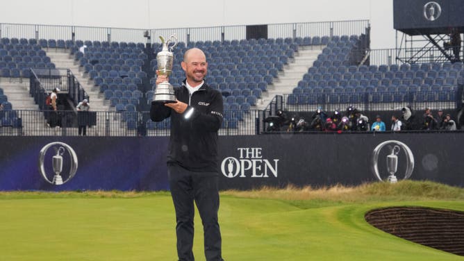 Brian Harman poses with the Claret Jug after winning The 151st Open Championship 2023 at Royal Liverpool in Hoylake, England.