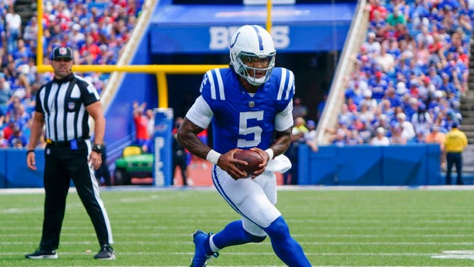 Colts QB Anthony Richardson runs with the ball against the Buffalo Bills during the first half of a preseason game at Highmark Stadium in Orchard Park, New York.