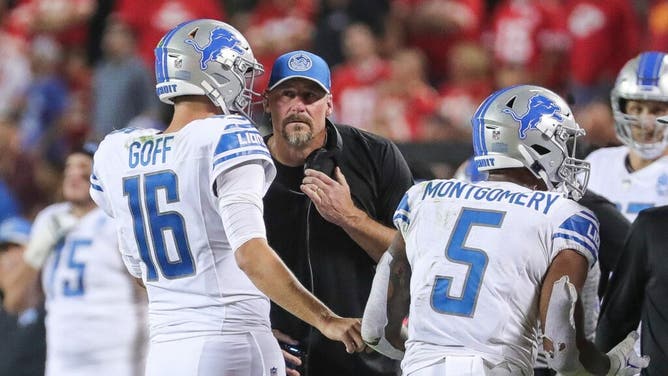 Detroit Lions QB Jared Goff strategizing with head coach Dan Campbell vs. Kansas City Chiefs in the 2023 NFL Kickoff Game at Arrowhead Stadium in Missouri.
