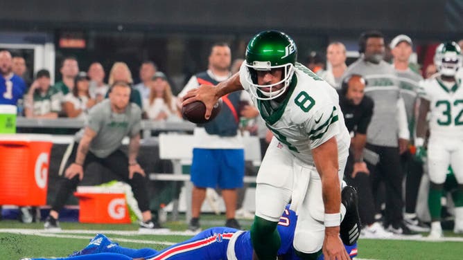 Jets injured quarterback Aaron Rodgers bemoans not being around team