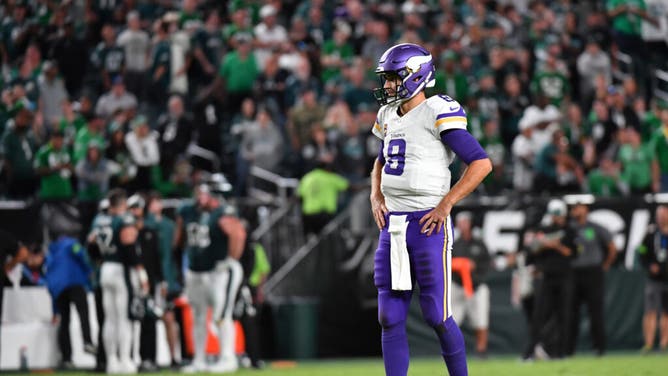 Vikings QB Kirk Cousins stands on the field after an incomplete pass vs. the Eagles at Lincoln Financial Field in Philadelphia.