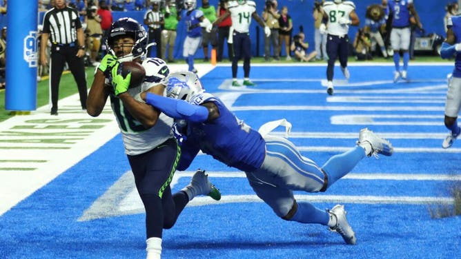 Seattle Seahawks WR Tyler Lockett catches a touchdown pass on Lions CB Jerry Jacobs at Ford Field in Detroit.