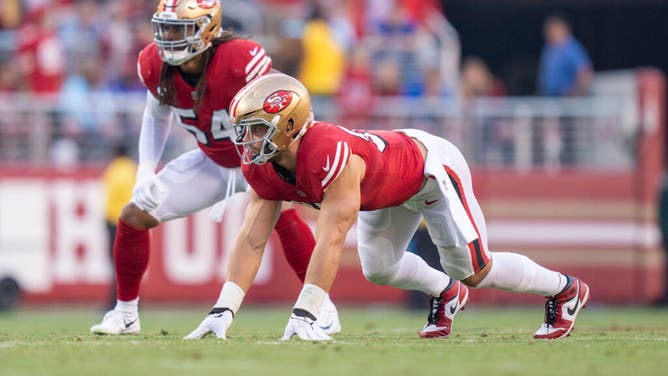 San Francisco 49ers DE Nick Bosa and LB Fred Warner wait for a snap against the New York Giants at Levi's Stadium in Santa Clara, California.