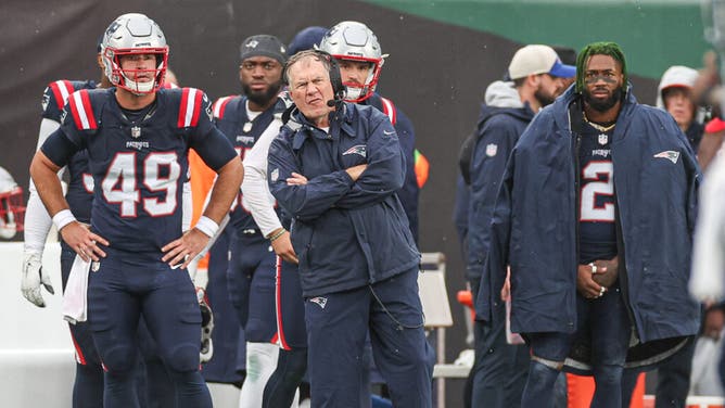 New England Patriots coach Bill Belichick scopes the scene in an NFL Week 3 game vs. the New York Jets at MetLife Stadium in East Rutherford, New Jersey.