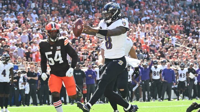 Baltimore Ravens QB Lamar Jackson scores a TD against the Browns at Cleveland Browns Stadium.