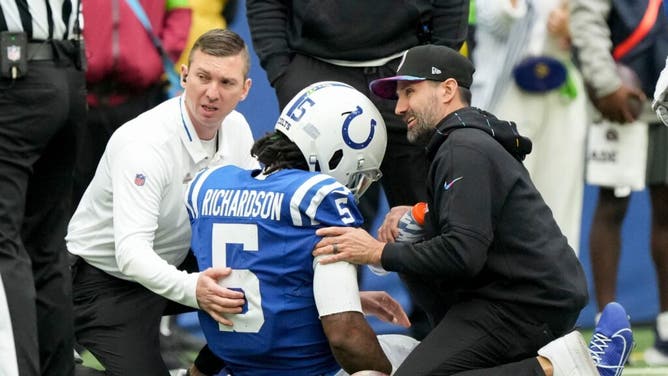 Colts team personnel tend to QB Anthony Richardson after getting hurt vs. the Tennessee Titans at Lucas Oil Stadium in Indianapolis.