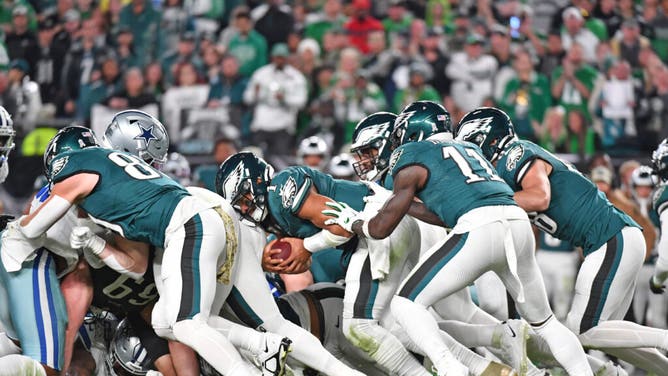 Eagles QB Jalen Hurts runs the 'Tush Push' with WR A.J. Brown and TE Dallas Goedert against the Dallas Cowboys at Lincoln Financial Field in Philadelphia.