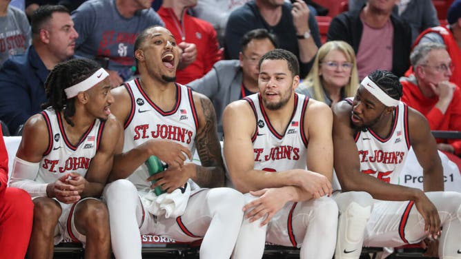 The St. John's Red Storm enjoying themselves on the bench vs. the Stony Brook Seawolves at Carnesecca Arena in Queens, New York.