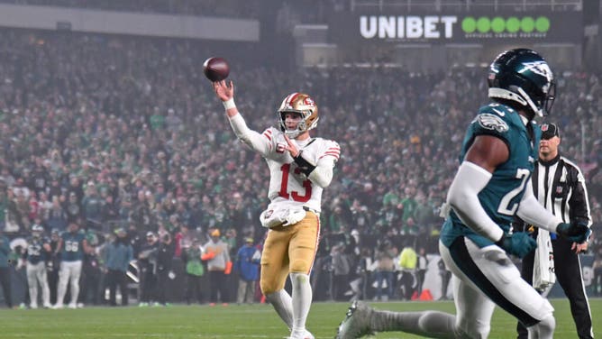 San Francisco 49ers QB Brock Purdy throws a TD vs. the Eagles at Lincoln Financial Field in Philadelphia.
