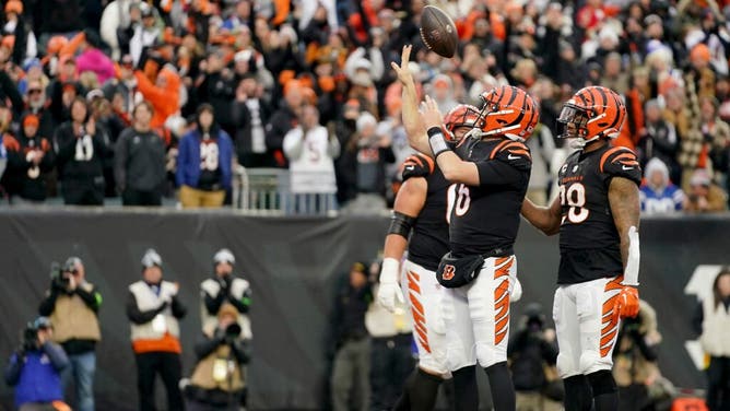 Bengals QB Jake Browning celebrates a rushing TD against the Indianapolis Colts in NFL Week 14 at Paycor Stadium in Cincinnati, Ohio.