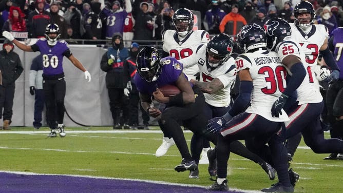 Baltimore Ravens QB Lamar Jackson scores a TD on the Houston Texans in the 2024 AFC divisional round at M&T Bank Stadium.