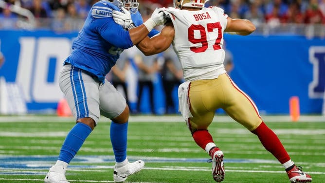 Detroit Lions RT Penei Sewell blocks San Francisco 49ers DE Nick Bosa at Ford Field during an NFL Week 1 game in 2021.