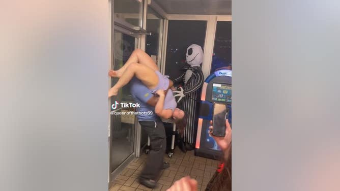 Woman Carried Out Of A Waffle House Upside Down, Shoeless By An Employee