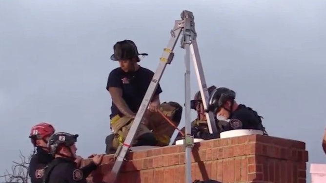 Woman stuck chimney San Diego