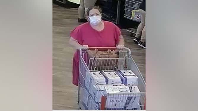 Woman wanted by police stolen Michelob Ultra
