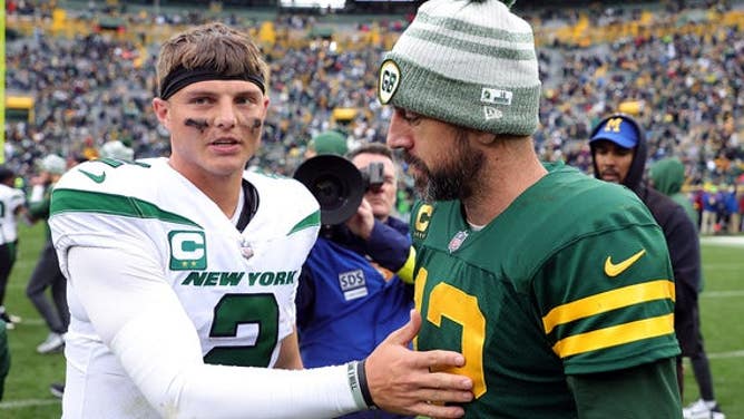 Zach Wilson and Aaron Rodgers