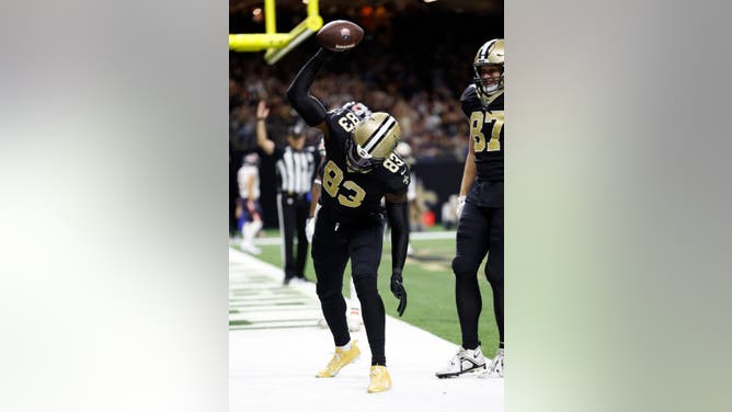 Juwan Johnson of the New Orleans Saints celebrates after scoring a touchdown against the Chicago Bears.
