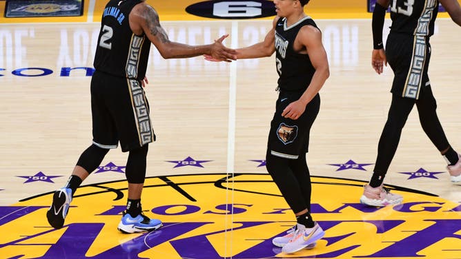 Grizzlies big Xavier Tillman and SG Desmond Bane high-five vs. the Lakers during Game 3 in Los Angeles.