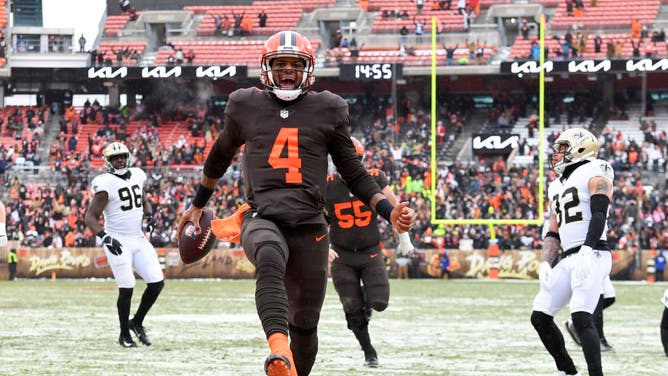 Cleveland Browns QB Deshaun Watson scores a 12-yard TD during the first half against the New Orleans Saints at FirstEnergy Stadium in Cleveland, Ohio.