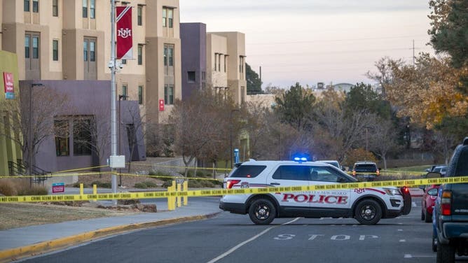 New Mexico State Police assists APD officers in investigating a deadly overnight shooting at Coronado Hall Dorms on the UNM Campus.