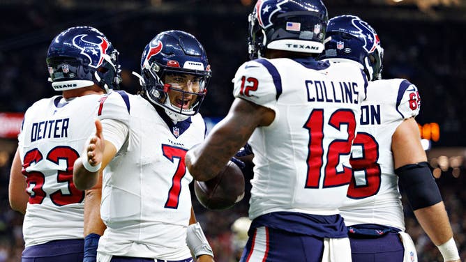 Texans WR Nico Collins celebrates with QB C.J. Stroud after a TD in an NFL preseason game vs. the Saints at Caesars Superdome in New Orleans.