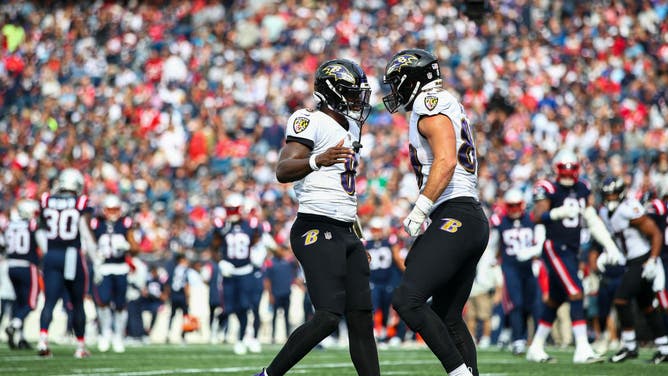 Ravens QB Lamar Jackson celebrates with TE Mark Andrews after a TD vs. the New England Patriots at Gillette Stadium in Foxborough, Massachusetts.