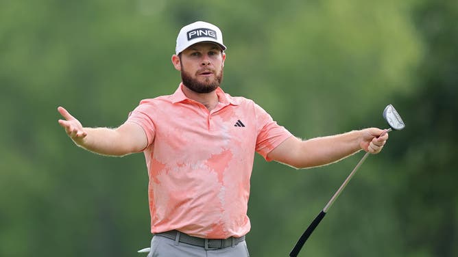 Tyrrell Hatton of England reacts after missing a putt during the BMW Championship at Olympia Fields Country Club on August 17, 2023 in Olympia Fields, Illinois.