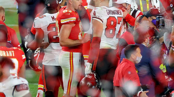 Two of the best tight ends of all-time, Travis Kelce and Rob Gronkowski, greet each other on the field following the Bucs Super Bowl victory over the Chiefs