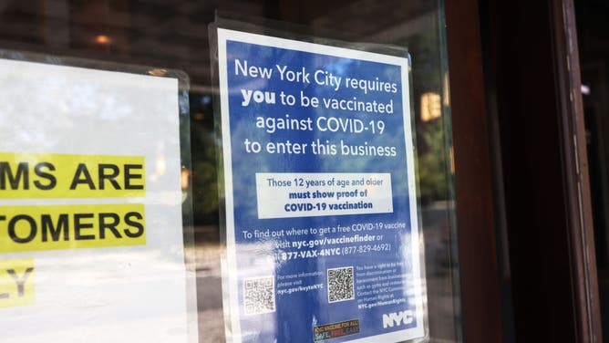 Unvaccinated individuals were barred from entering indoor businesses in New York